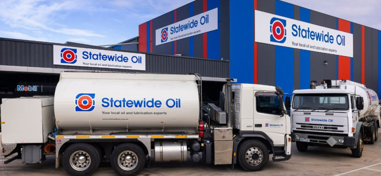 statewide oil trucks infront of head office building